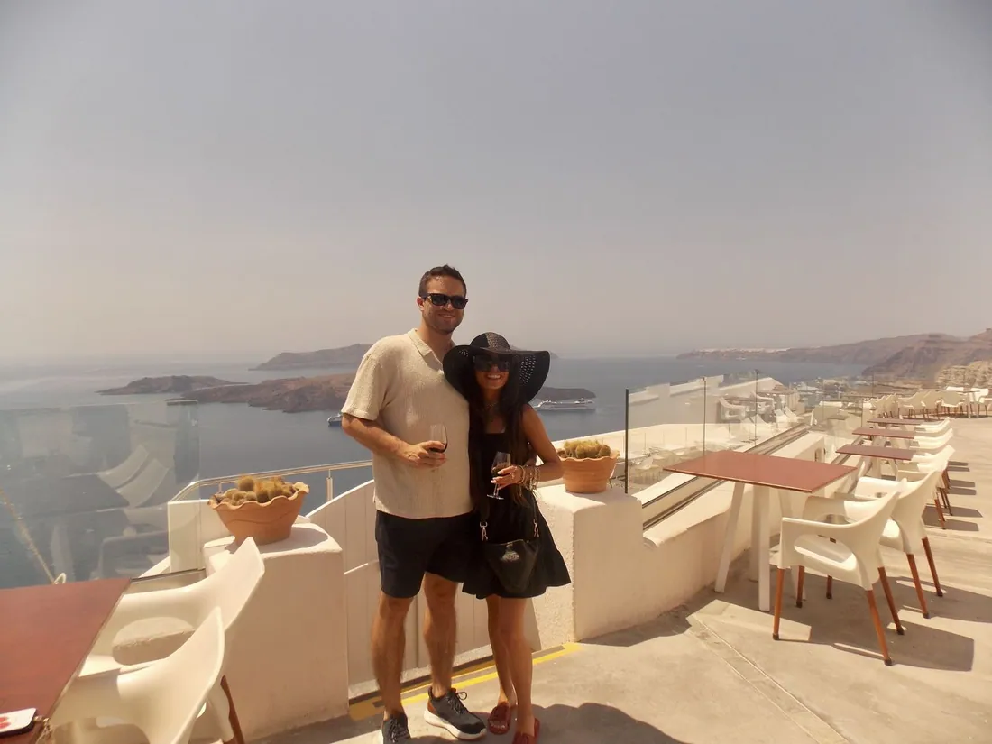 Frankie and Maddie on a terrace in Santorini
